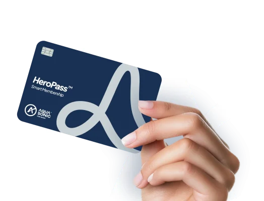 Hand Holding Aquasonic Heropass Membership Card